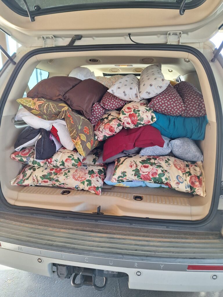 Doggie beds made from quilting material scraps by RWYS Quilting ministry Phoenix, AZ