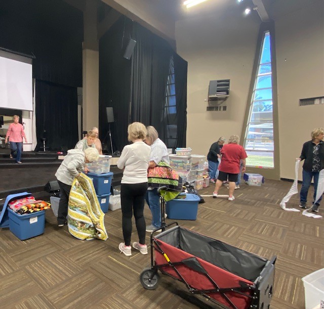 Sorting quilts for Distribution Night