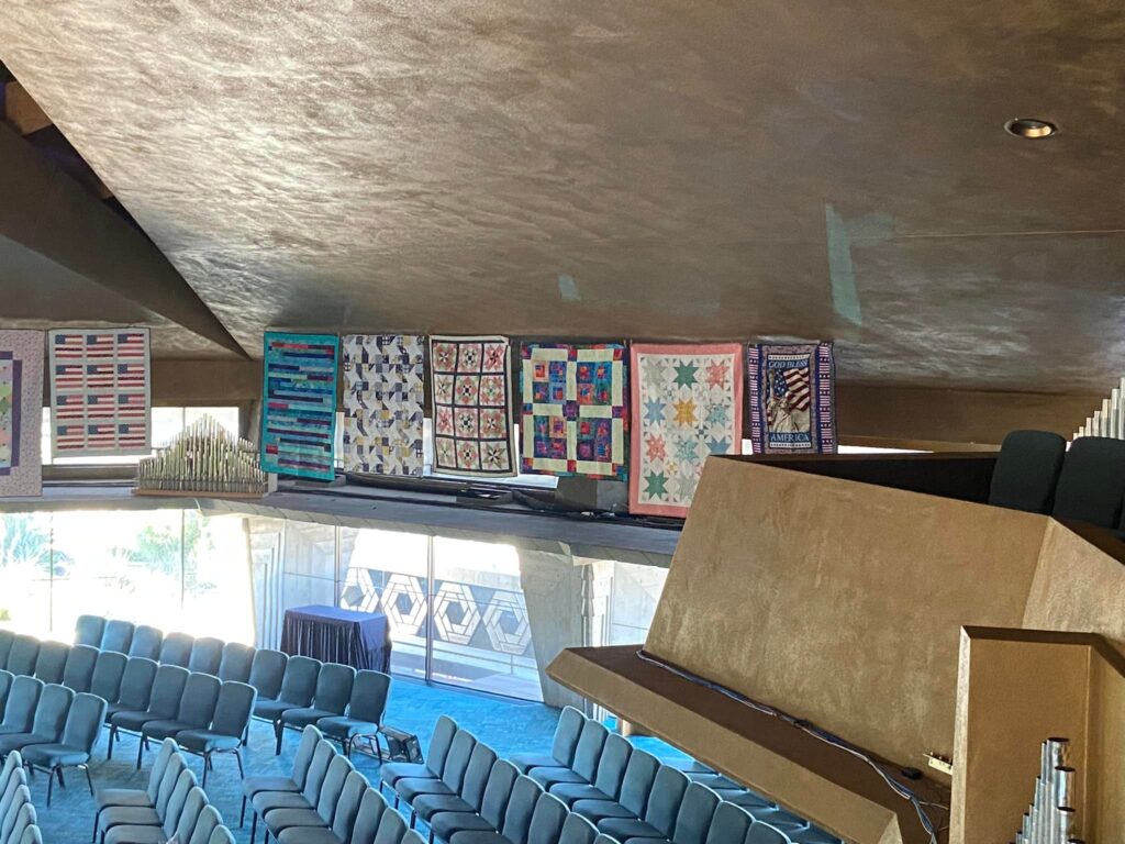 Quilts hung for distribution night at FCC